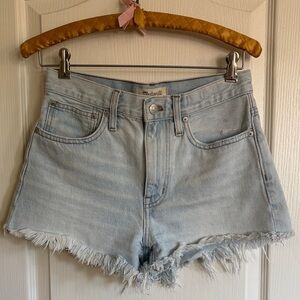 Madewell high waist relaxed denim cut-off shorts in light blue wash.